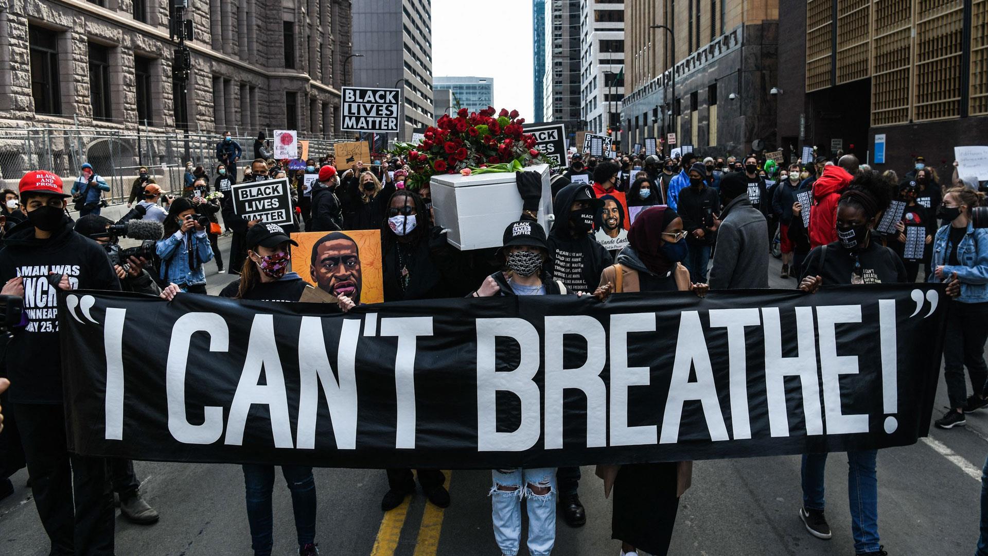 Thousands attend silent march in Minneapolis calling for justice for George Floyd