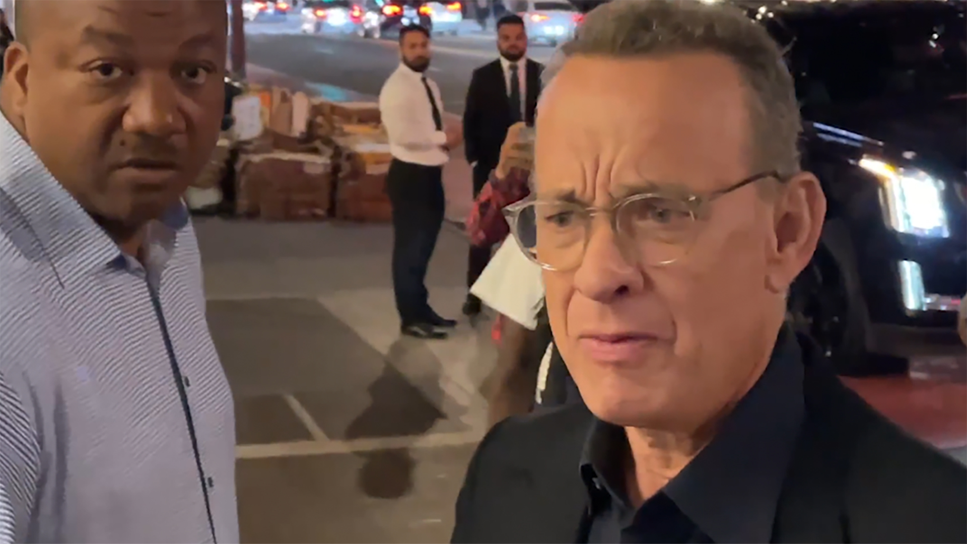 WATCH Tom Hanks shouts at fans after group knocks into Rita Wilson picture
