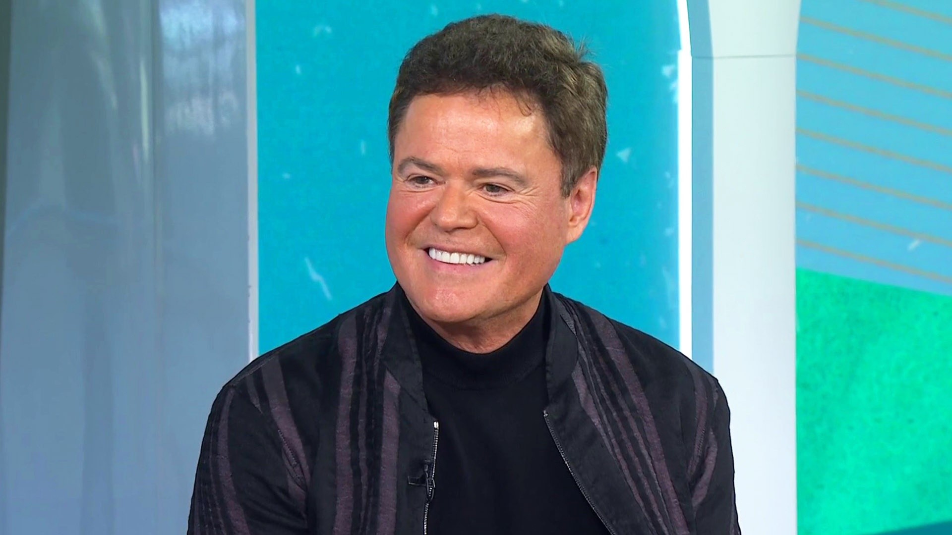 Watch Donny Osmond rap about his six-decade career
